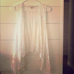 White crochet Flying Tomato Vest.